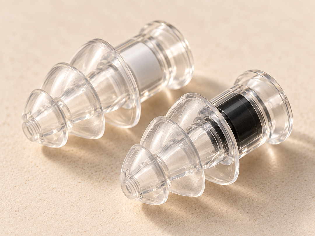 The earplugs in their neutral finishes